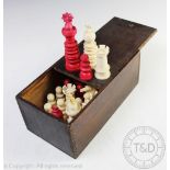 A 19th century 'Lund' style ivory chess set within stained pine box,