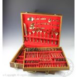A cased canteen of gilt metal cutlery set, Thai, each piece cast with Buddha terminal,