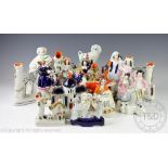 A collection of assorted Staffordshire figures, animals and groups,