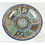 An Islamic tin glazed pottery bowl,
