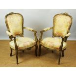 A Louis XV style carved gilt wood and gesso salon suite, c1900,