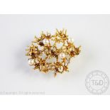 An 18ct gold, diamond and untested pearl set brooch, import mark for 1968 and stamped 'Asia 750',