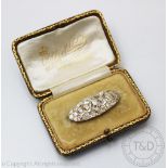 A Victorian mine cut diamond set brooch (converted from a clasp),