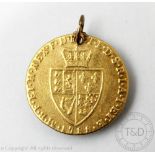 A George III gold spade Guinea coin dated 1788, shield back, pierced pendant mount, gross weight 8.