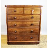 A Victorian mahogany chest of two short over four long drawers, turned handles and on plinth base,