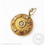 A Victorian gem set locket,