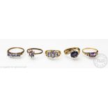 Five purple gem set rings, each in different style settings and set in 9ct gold, gross weight 9.