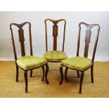 Three Edwardian mahogany and marquetry inlaid chairs with upholstered seats (3)