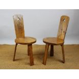 A pair of Reynolds of Ludlow pine chairs, with circular seats on shaped legs, 90cm high,