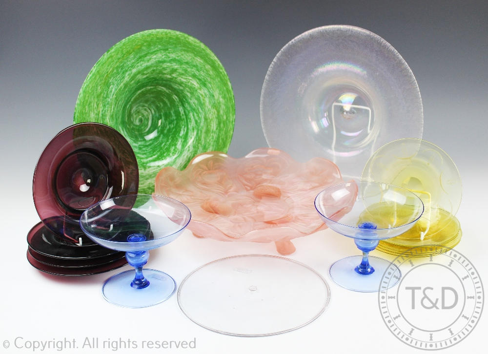 A collection of early 20th century and later glass centre bowls and plates,