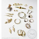 A selection of gold and gold coloured jewellery, to include; an onyx set signet ring,