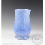 A Scottish art glass vase of tapering form and with flared lip, in a cornflower blue swirl design,