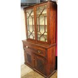 A Victorian carved walnut secretaire book case,