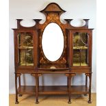 An Edwardian Arts and Crafts inlaid mahogany display cabinet, in the manner of Shapland and Petter,