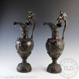 A late 19th century pair of Renaissance revival bronze ewers,