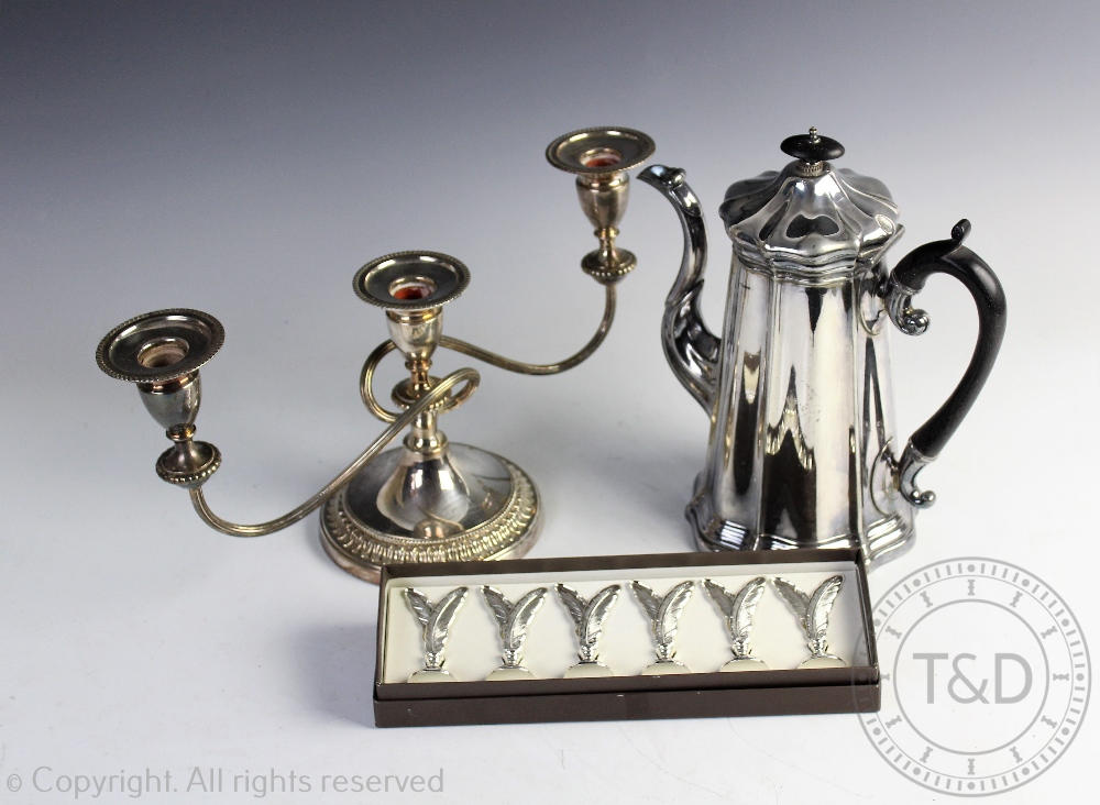A silver plated coffee pot, 26cm high, a Viners of Sheffield twin branch candelabra,