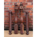 Two pairs of carved mahogany bed posts with with barley twist, carved acanthus and fluted detail,