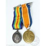 A WWI medal pair to 'E.