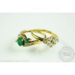 A diamond and emerald cluster ring,