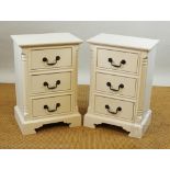 A pair of modern painted white bedside chests, with three drawers on bracket feet.