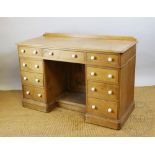 A late Victorian pine pedestal desk,