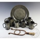A collection of 19th pewter tankards including a pair of Imperial pint examples,