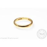 An 18ct yellow gold wedding band, size N, weight 3.