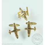 A pair of 9ct gold Spitfire cufflinks and a matching tie stud, the cuff links with bar fittings,