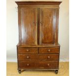 A Victorian stained pine country kitchen cupboard, with two arched panel doors,
