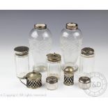A selection of silver mounted glass ware to include a pair of star cut vases,