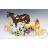 A collection of Beswick comprising; a Highland Dunn pony, 17.
