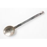 An Arts and Crafts silver spoon London 1926, sponsors mark 'F.