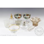 A collection of early 20th century gilt decorated glassware to include a frosted glass and gilt