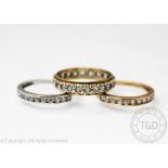 A 9ct yellow gold full eternity ring set with colourless stones,
