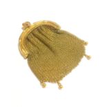 A 9ct gold ladies purse, of small proportions, the gold clasp suspending gilt mesh bag,