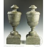 A pair of carved, reconstituted and painted lamp bases,