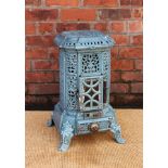 A French cast iron Godin type stove, with floral detailing,