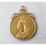 A Victorian gold £2 two pound coin, dated 1887, soldered scroll pendant mount, gross weight 17.