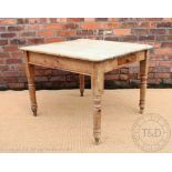 A Victorian pine county kitchen table, with four plank top above a frieze drawer,