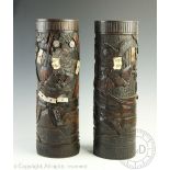 A pair of Japanese carved bamboo shibayama vases, Meiji period, each depicting a Samurai warrior,