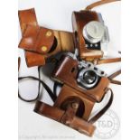 A Leica DRP camera in leather case, numbered 235 456,