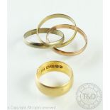 An 18ct yellow gold wedding band, size J, weight 4.