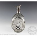 A Haig's Whisky white metal overlay dimple decanter, signed 'Nice, France' to underside,
