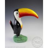 A vintage novelty advertising Guinness model of a toucan,