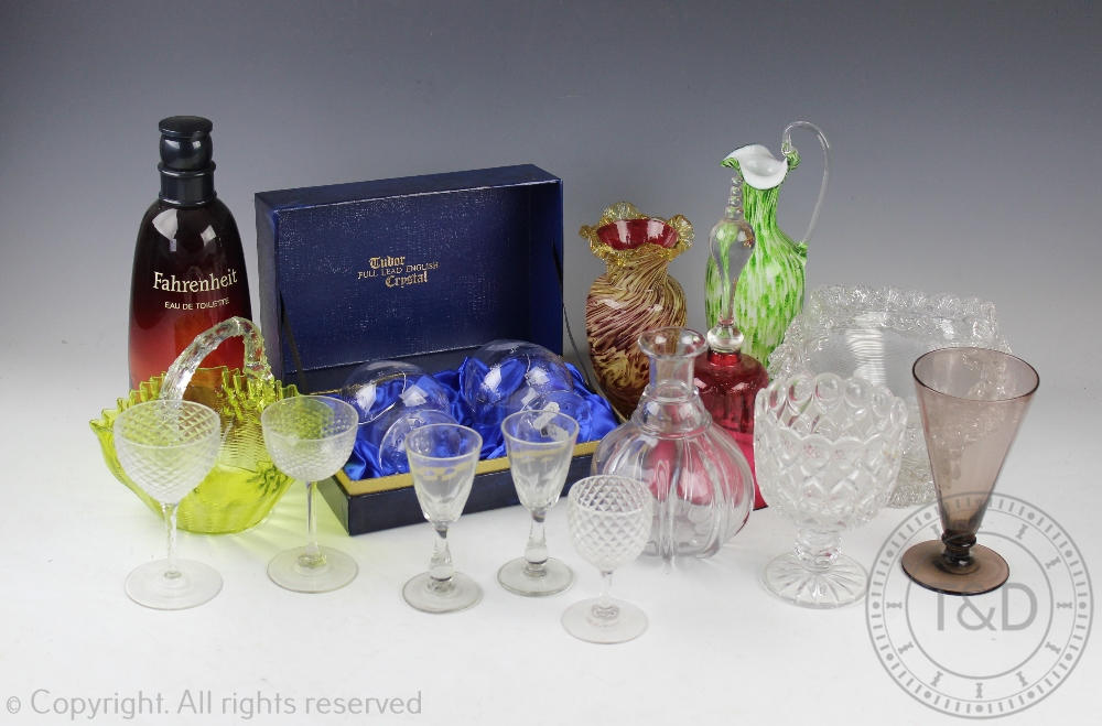 A large collection of assorted glassware to include a vintage Eau De Toilet 'Fahrenheit' bottle and