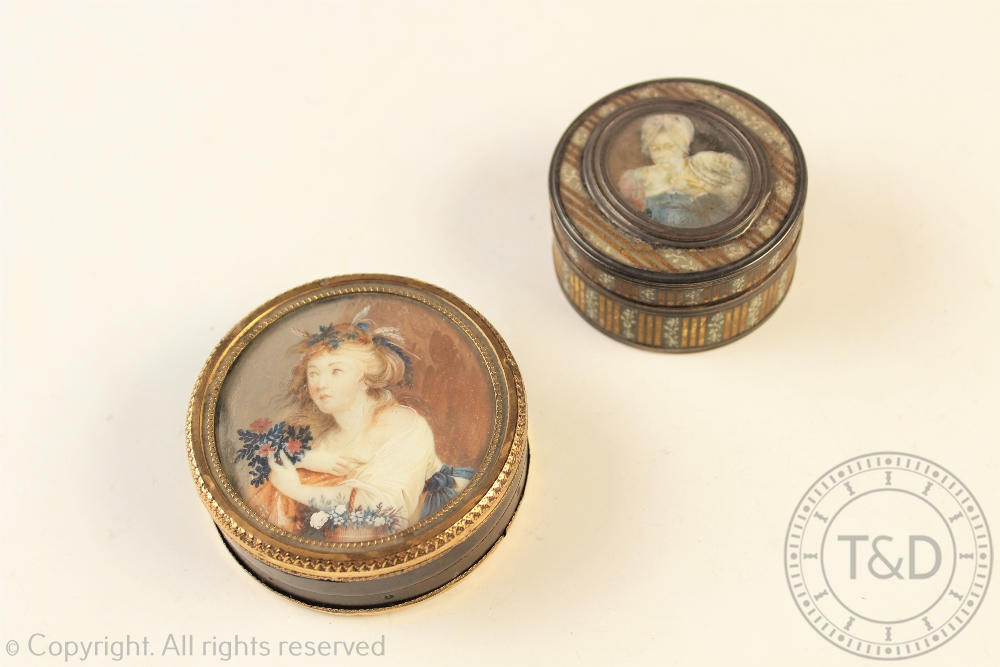 Two early 19th century French circular boxes, the larger tortoiseshell with gilt metal mounts,