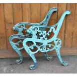 A pair of cast iron lions mask bench ends,