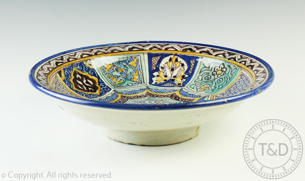 An Islamic tin glazed pottery bowl, - Image 2 of 3