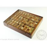 A collection of 100, 19th century and later, microscope slides, many with hand written paper labels,