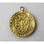 A George III gold half Guinea coin dated 1787, shield back, soldered pendant mount, gross weight 4.